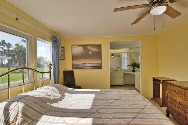 a room with a dresser and mirror