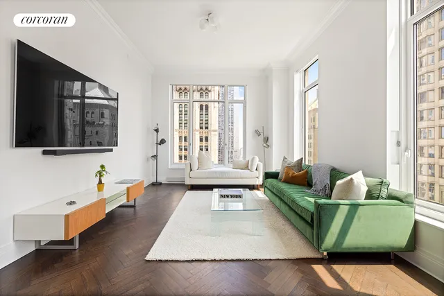 a living room with furniture and a window