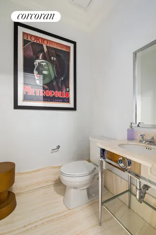 a bathroom with a double vanity sink and mirror with bathtub