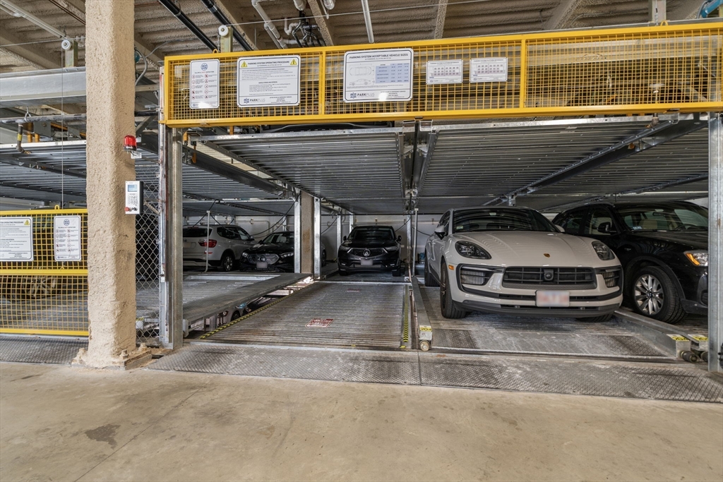 30 Penniman Road, Unit 201 Boston, MA 02134 - Photo 20 of 23 a view of parking garage with cars