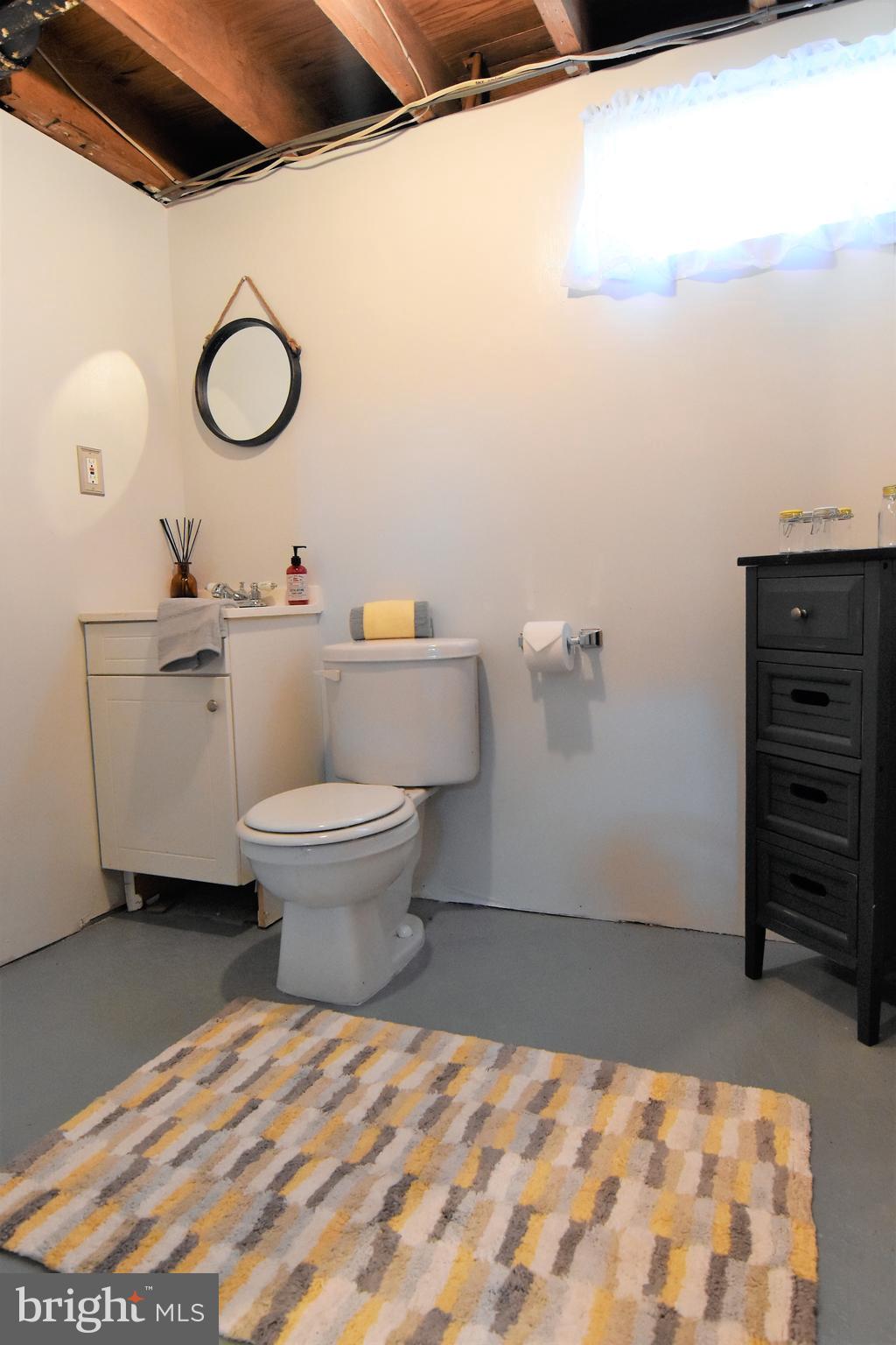 8047 Highpoint Road Clearwater Beach, MD 21226 - Photo 26 of 54 lower level 1/2 bath, room to make full bath