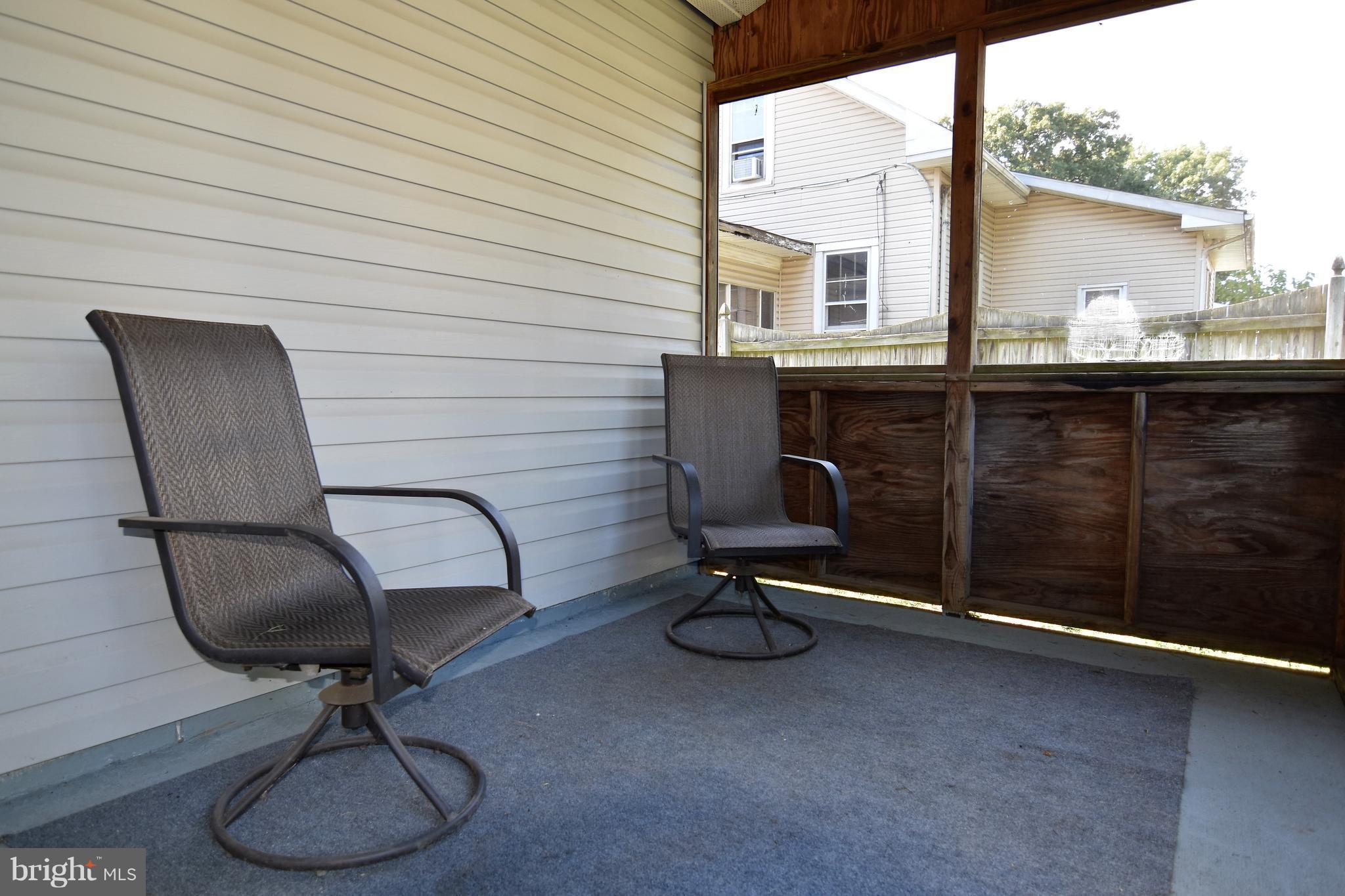 8047 Highpoint Road Clearwater Beach, MD 21226 - Photo 33 of 54 enclosed porch, off kitchen