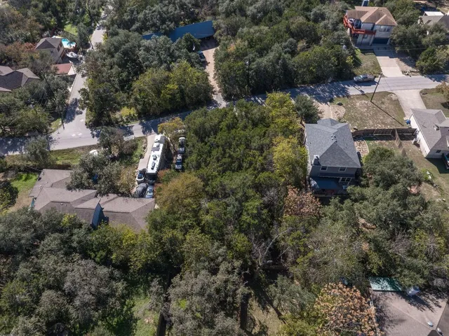 an aerial view of residential house with outdoor space