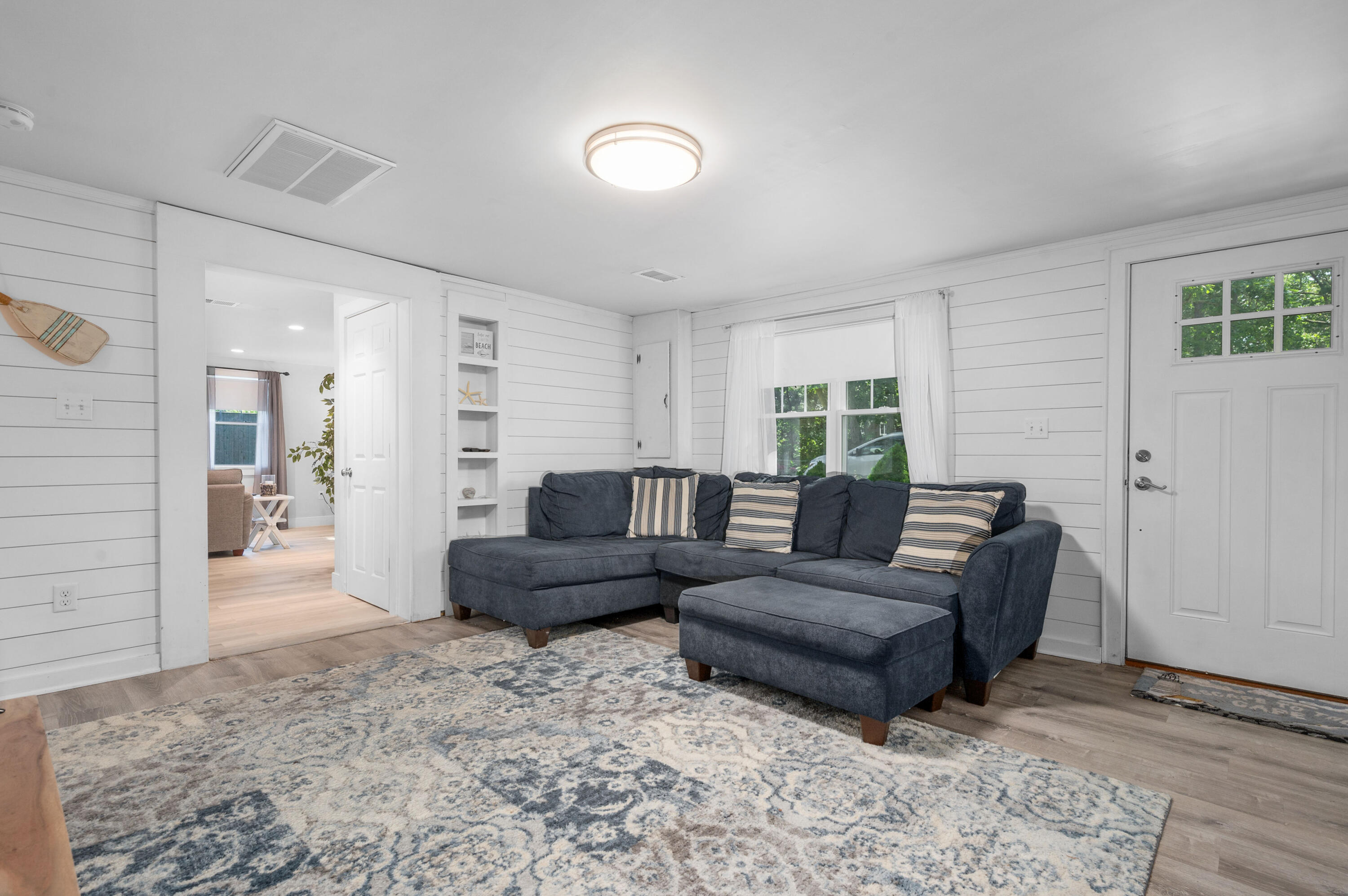 36 Riverside Road Mashpee, MA 02649 - Photo 14 of 48 a living room with furniture and a couch