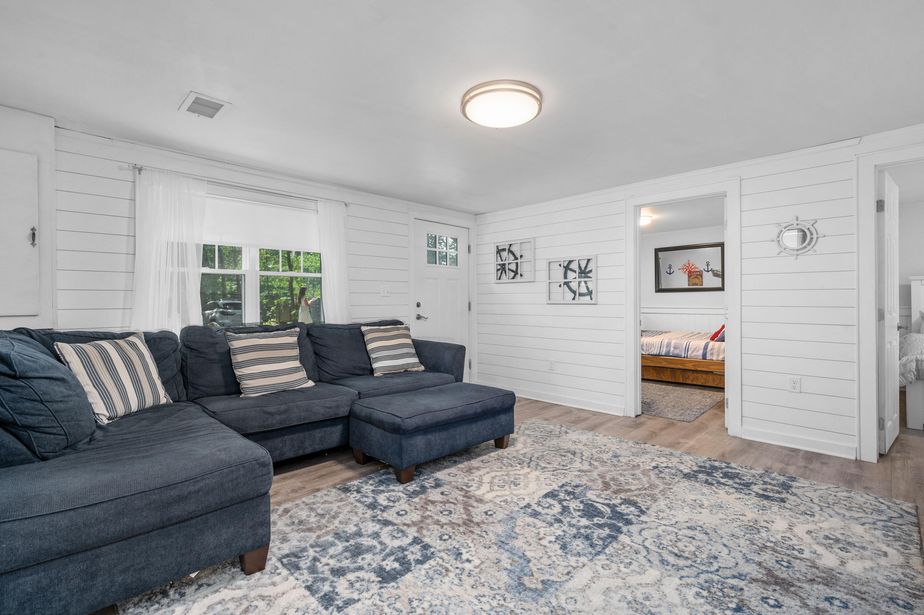 36 Riverside Road Mashpee, MA 02649 - Photo 15 of 48 a living room with furniture and a window
