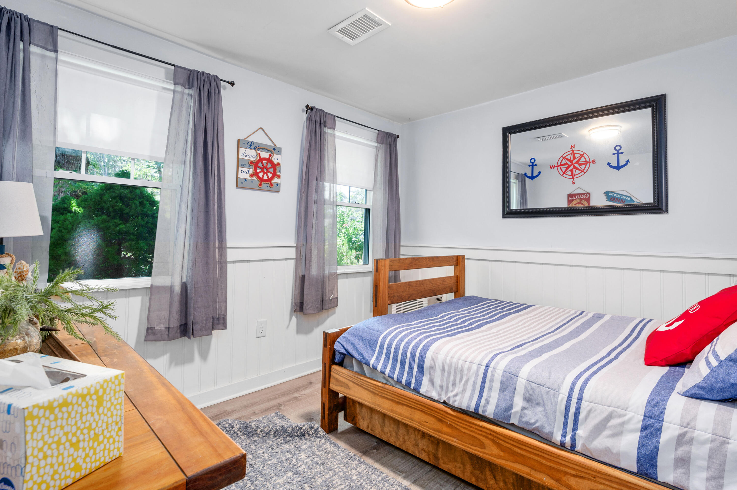 36 Riverside Road Mashpee, MA 02649 - Photo 21 of 48 a bedroom with a bed and a couch