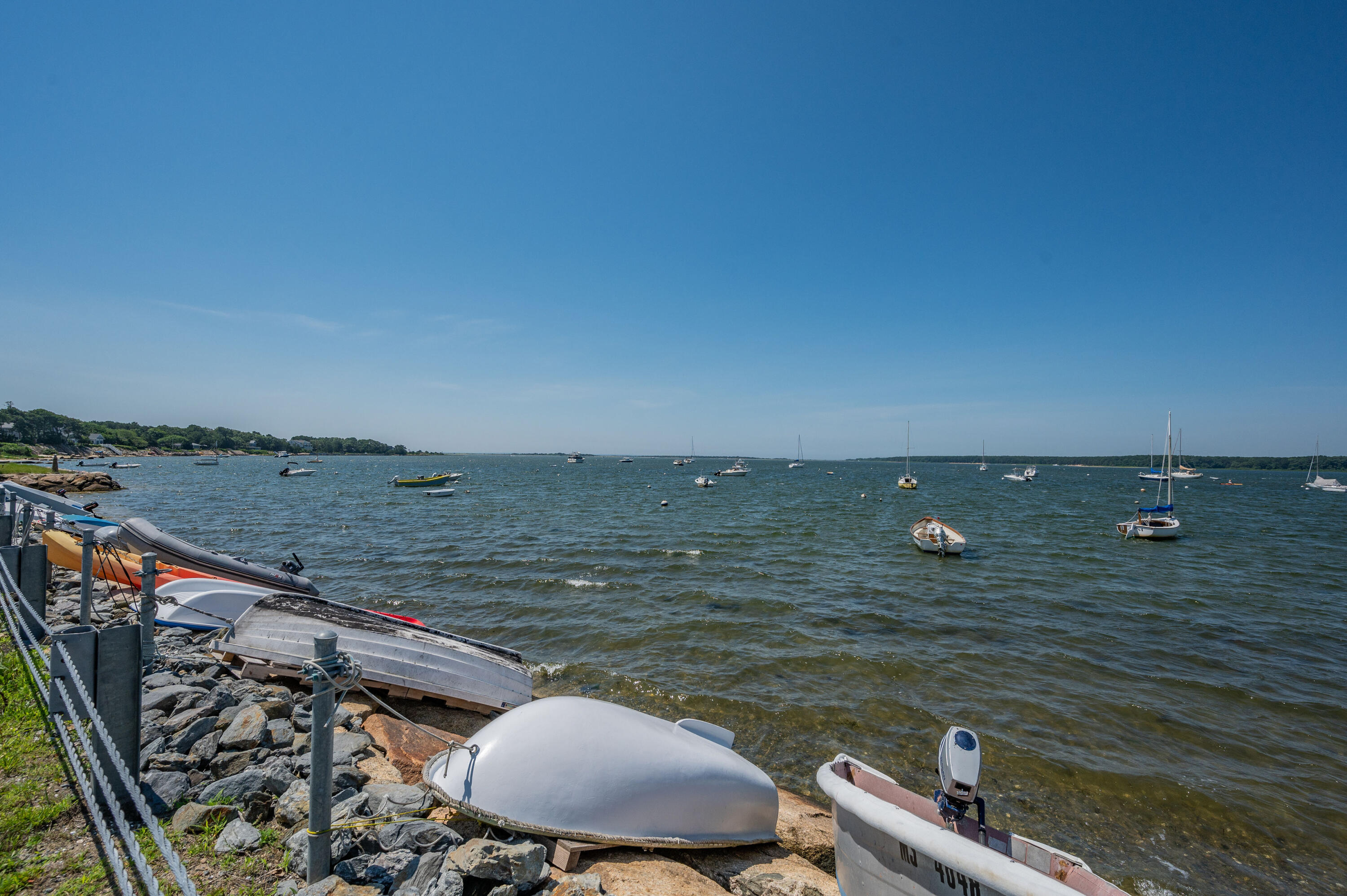 36 Riverside Road Mashpee, MA 02649 - Photo 42 of 48 a view of an ocean from a balcony