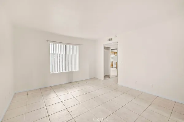 a view of a bathroom with a glass shower door