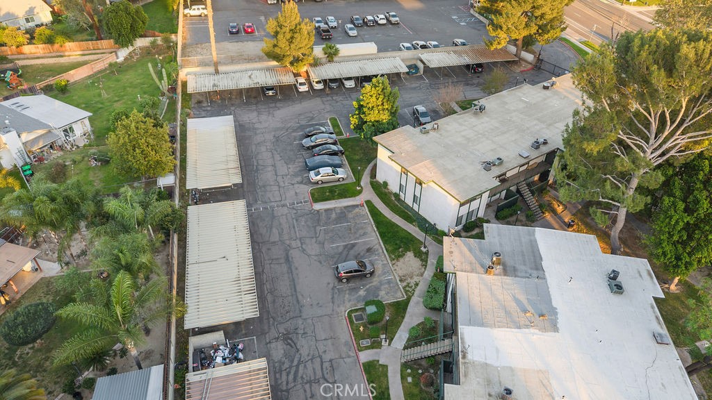 1735 East Washington Street, Unit F14 Colton, CA 92324 - Photo 22 of 26 an aerial view of residential houses with outdoor space