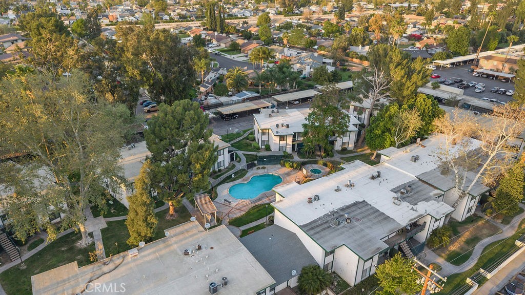 1735 East Washington Street, Unit F14 Colton, CA 92324 - Photo 24 of 26 an aerial view of a house with a yard