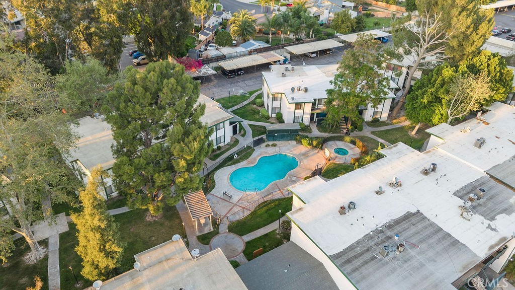 1735 East Washington Street, Unit F14 Colton, CA 92324 - Photo 26 of 26 an aerial view of a house with a swimming pool