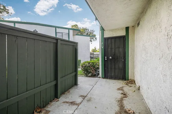 a bathroom with a shower and a sink