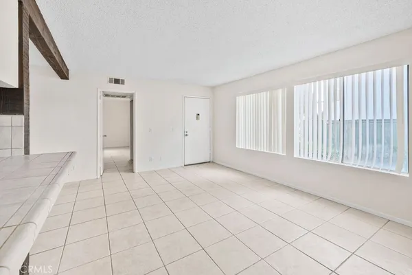 a view of a room with a hallway