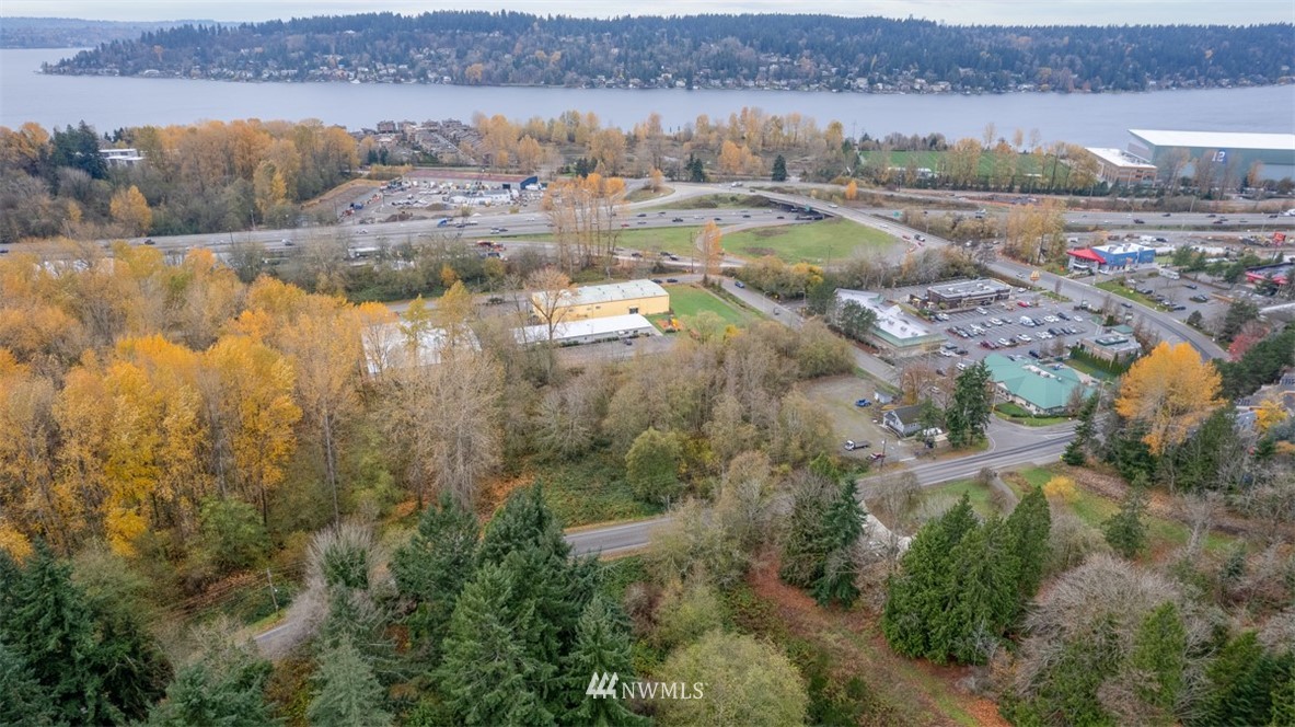 4196 Lincoln Court Northeast Renton, WA 98056 - Photo 7 of 13 an aerial view of residential houses with outdoor space and river