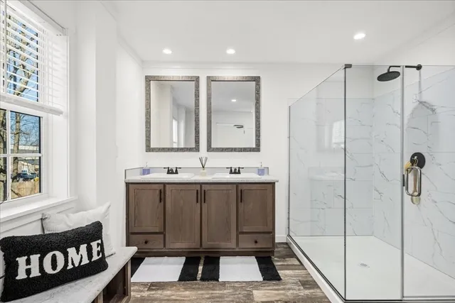 a bathroom with a sink and a mirror