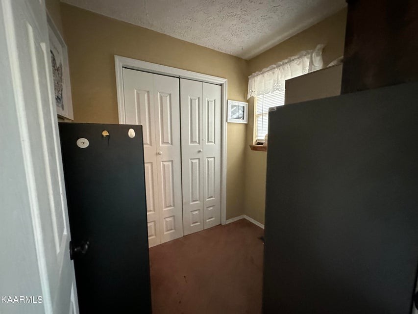291 Dynatex Road Sunbright, TN 37872 - Photo 15 of 23 view of a closet with wooden floor