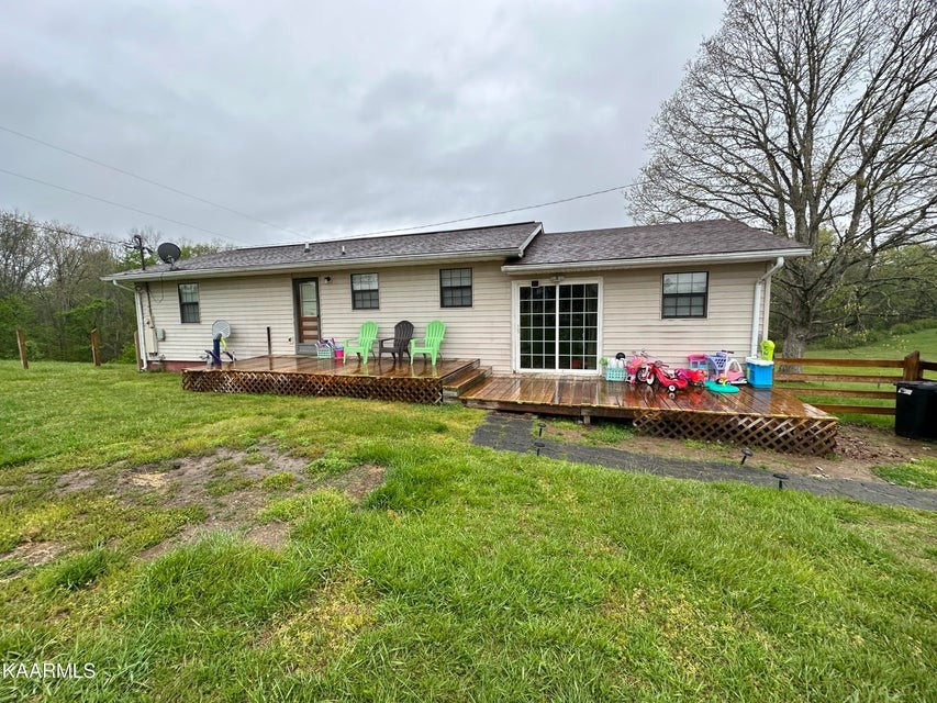 291 Dynatex Road Sunbright, TN 37872 - Photo 3 of 23 a front view of house with yard and outdoor seating