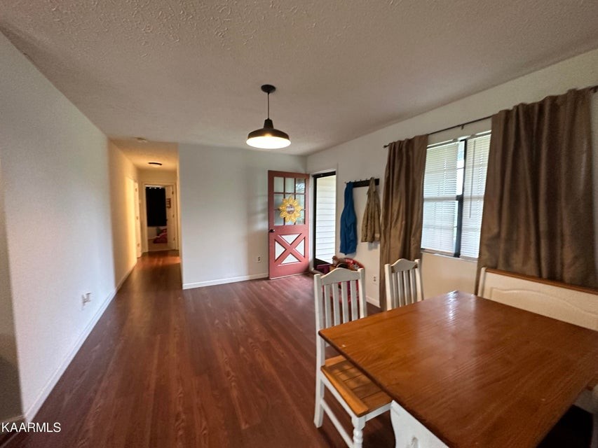 291 Dynatex Road Sunbright, TN 37872 - Photo 6 of 23 a view of a dining room with furniture and window