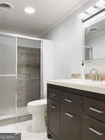 a kitchen with granite countertop a stove sink and cabinets
