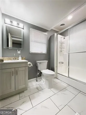 a view of a livingroom with wooden floor