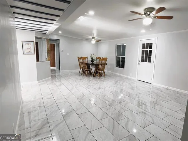 a view of a livingroom with furniture