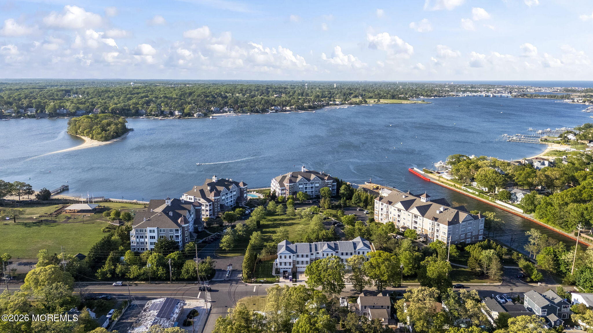 2201 River Road, Unit 4207 Point Pleasant, NJ 08742 - Photo 26 of 34 an aerial view of a house with a lake view