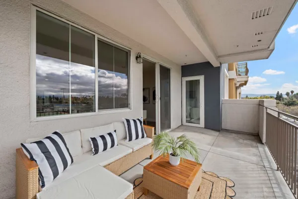 a view of a balcony with city view