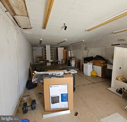 a view of a kitchen with a sink