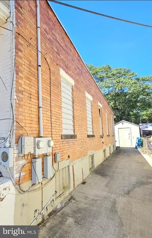 a view of a balcony with chairs