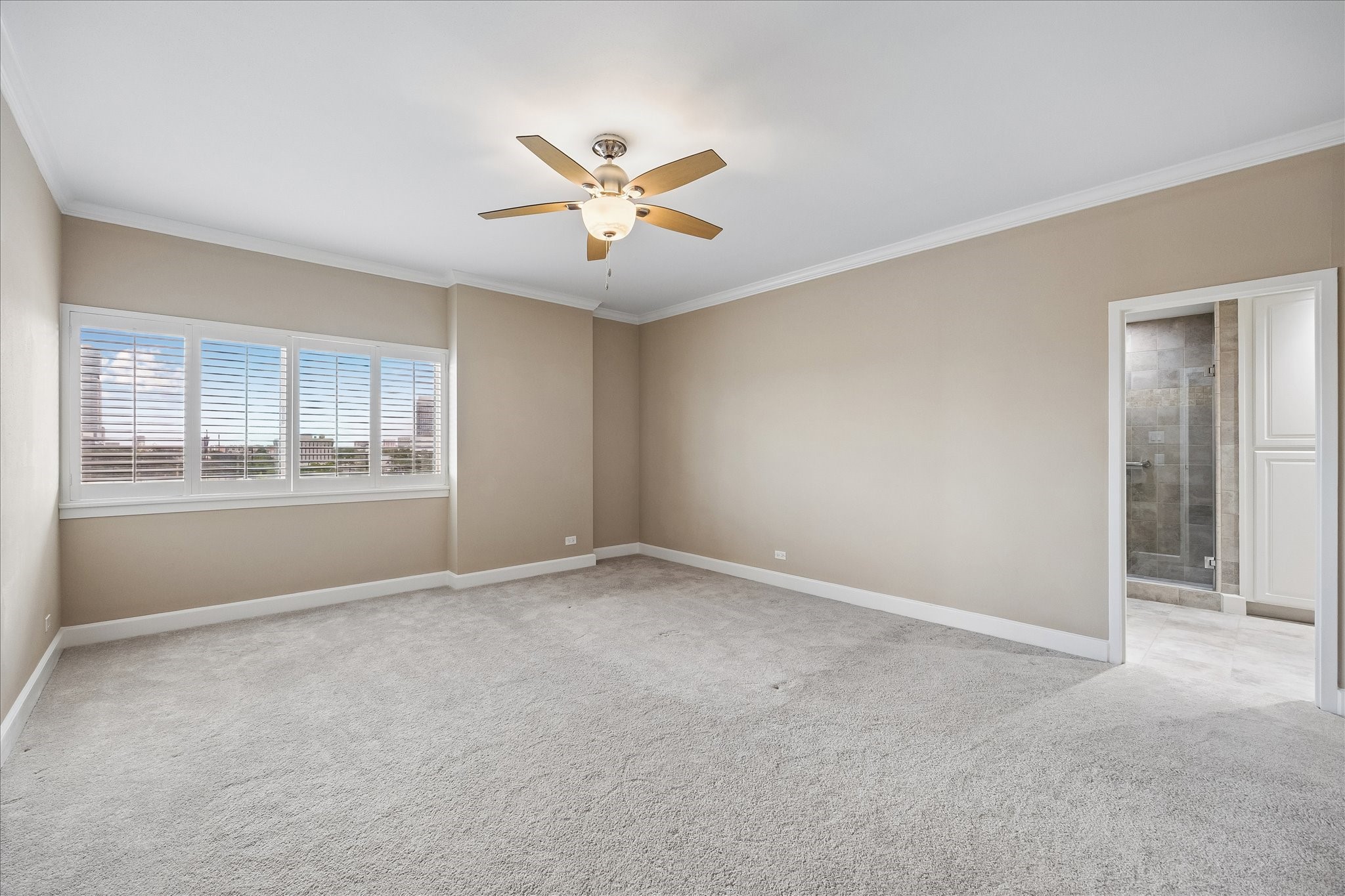 2929 Buffalo Speedway, Unit A513 Houston, TX 77098 - Photo 8 of 24 a view of an empty room with a window