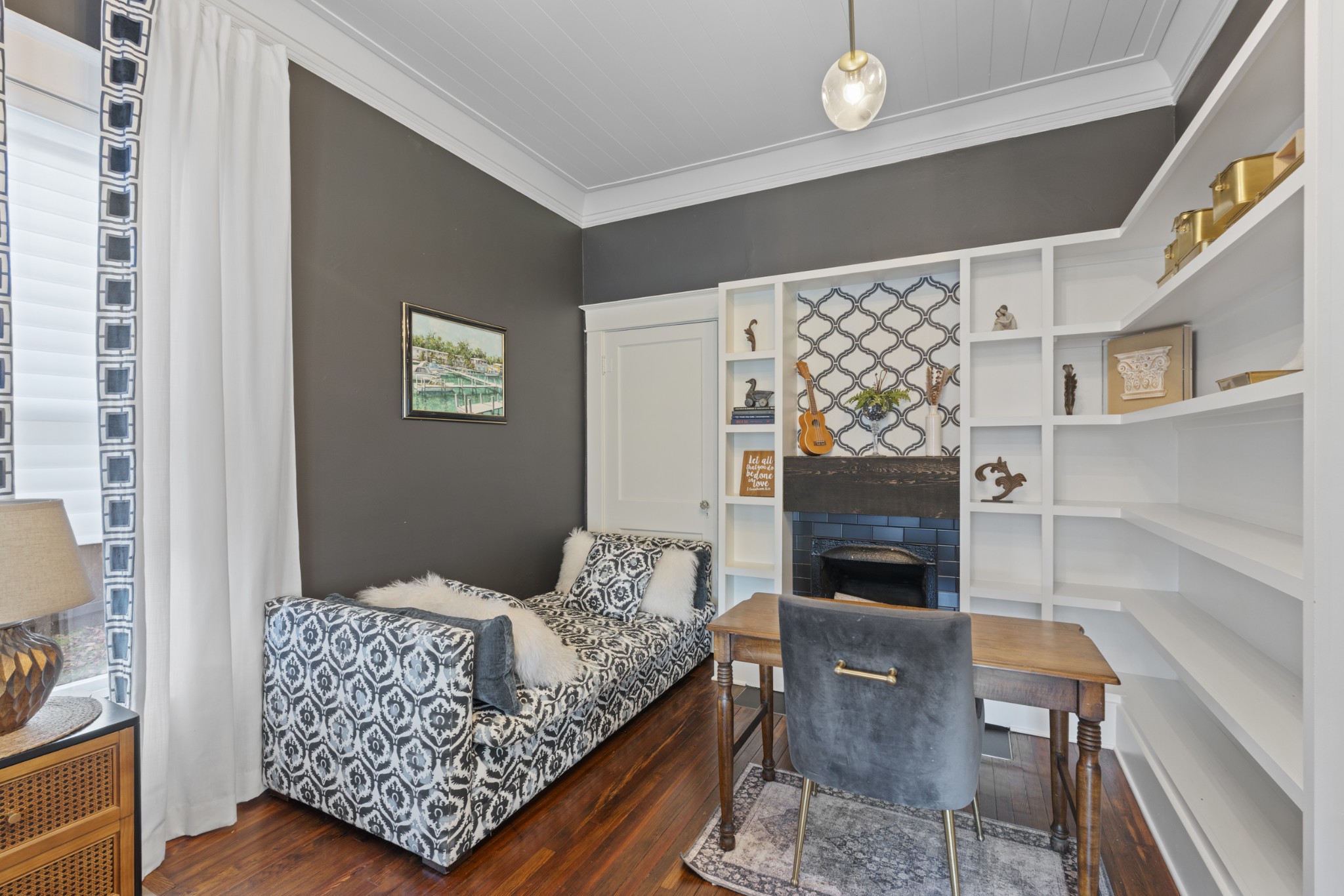 706 West 7th Street Columbia, TN 38401 - Photo 14 of 52 a bedroom with furniture and a fireplace