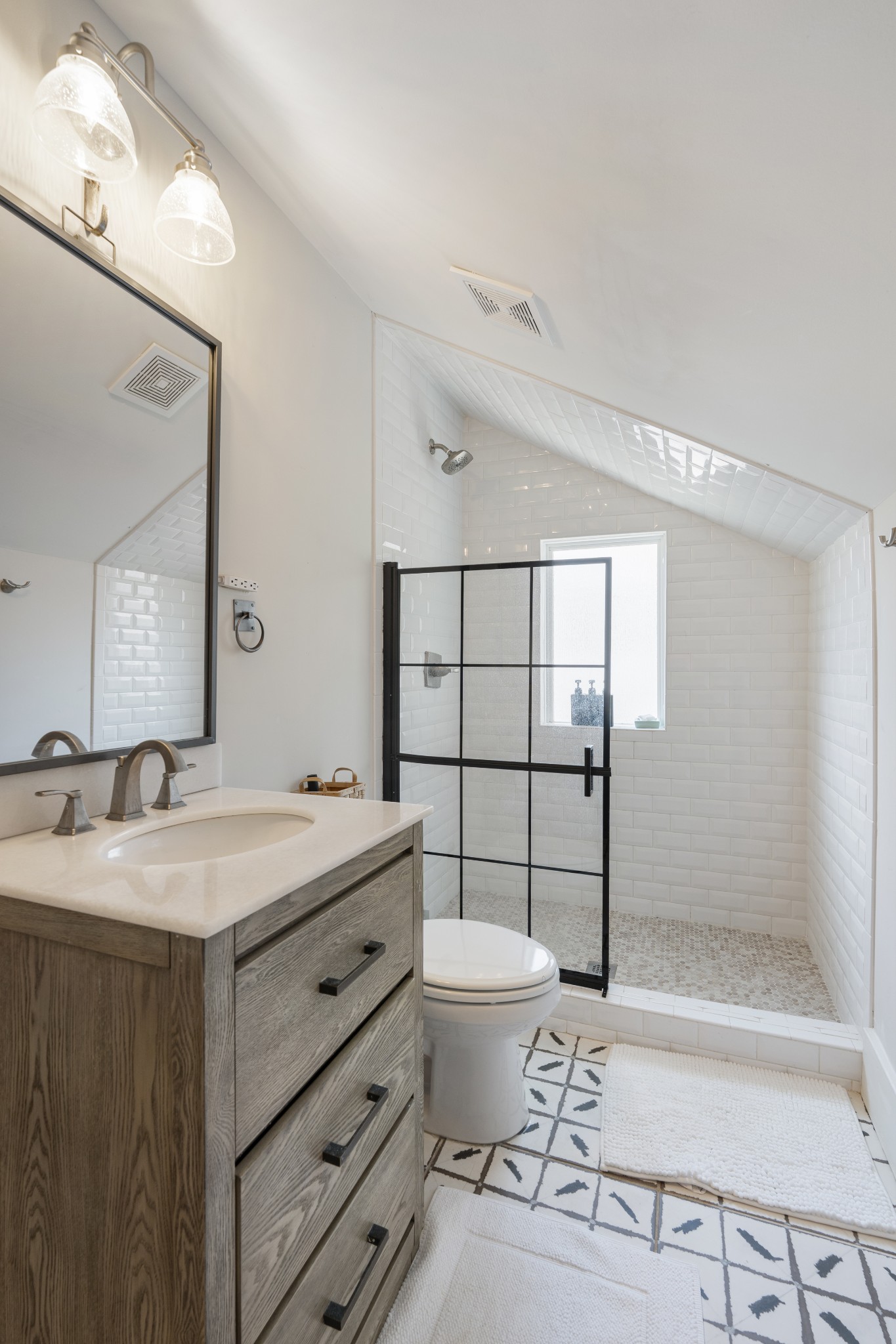 706 West 7th Street Columbia, TN 38401 - Photo 22 of 52 a bathroom with a granite countertop sink toilet mirror and shower