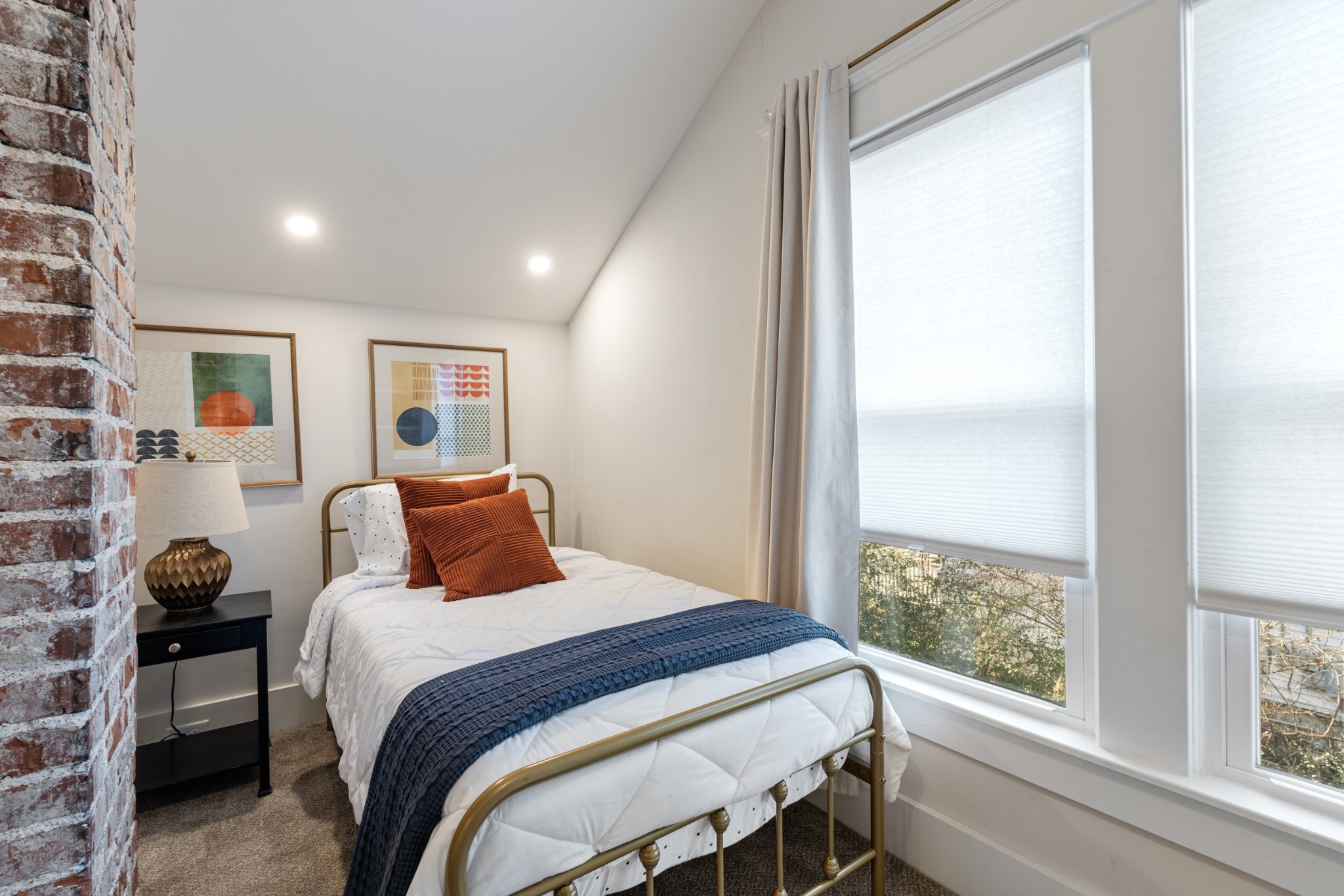 706 West 7th Street Columbia, TN 38401 - Photo 24 of 52 a bedroom with a bed and a window