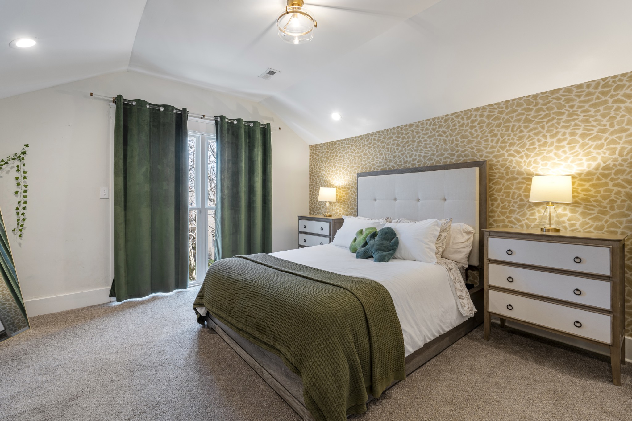 706 West 7th Street Columbia, TN 38401 - Photo 25 of 52 a bedroom with a bed and a chandelier