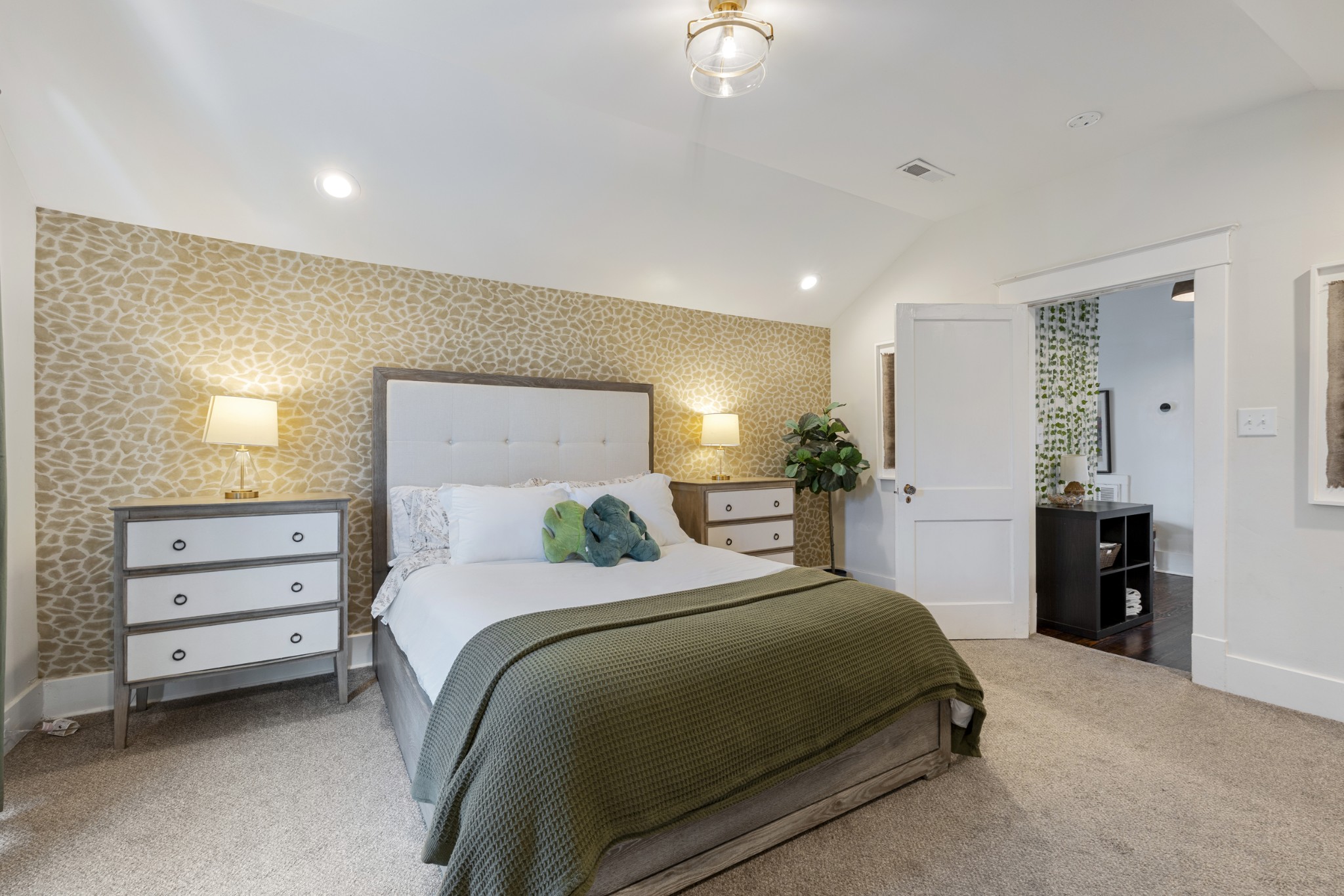 706 West 7th Street Columbia, TN 38401 - Photo 26 of 52 a bedroom with a bed and a chandelier