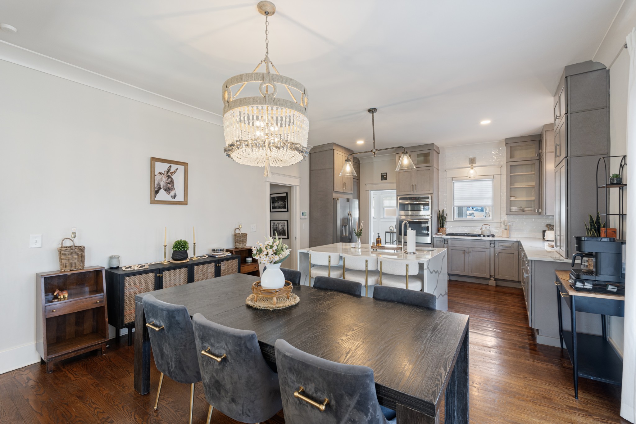 706 West 7th Street Columbia, TN 38401 - Photo 8 of 52 a view of a dining room with furniture wooden floor and chandelier