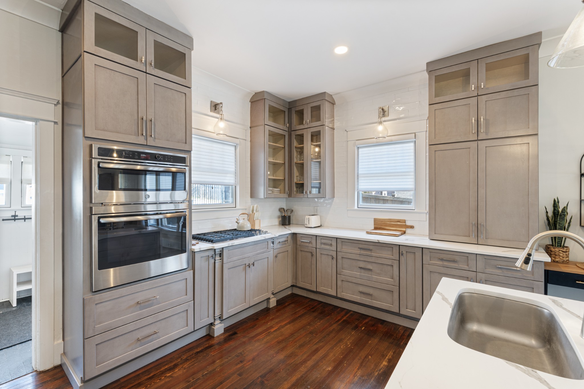 706 West 7th Street Columbia, TN 38401 - Photo 9 of 52 a kitchen with stainless steel appliances granite countertop a sink and cabinets