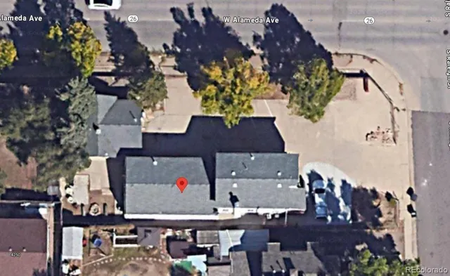 an aerial view of a highlighted house