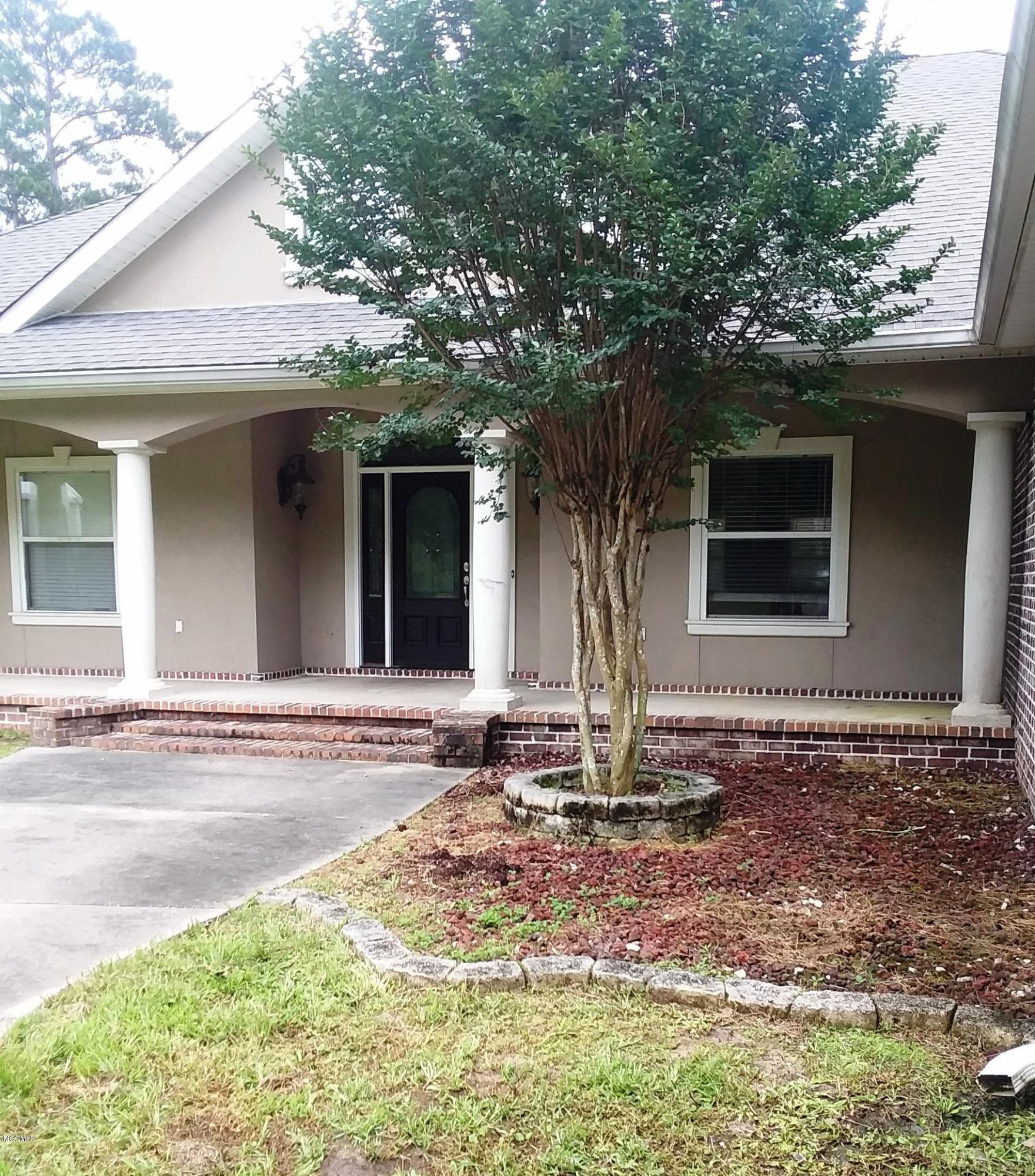 18640 White Plains Road Saucier, MS 39574 - Photo 4 of 37 Exterior Home Front Garden