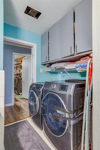 a utility room with dryer and washer