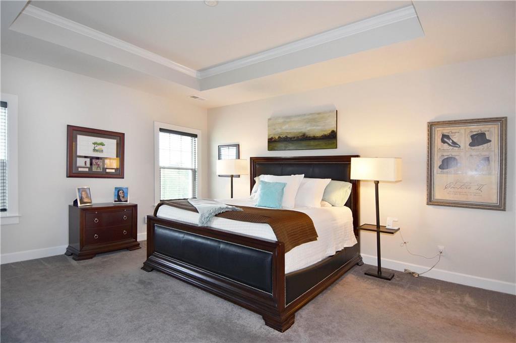 4103 Spruce Road Gibsonia, PA 15044 - Photo 12 of 25 a bed room with a bed and a night stand