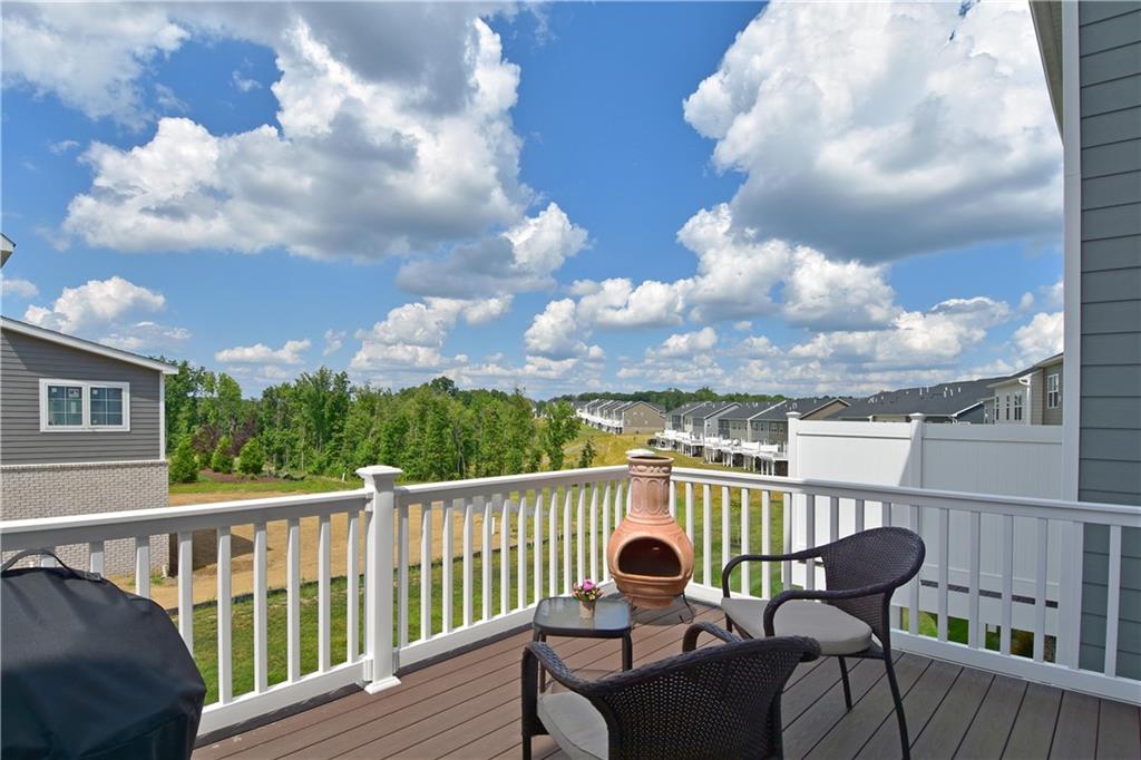 4103 Spruce Road Gibsonia, PA 15044 - Photo 23 of 25 a view of a chair in a balcony