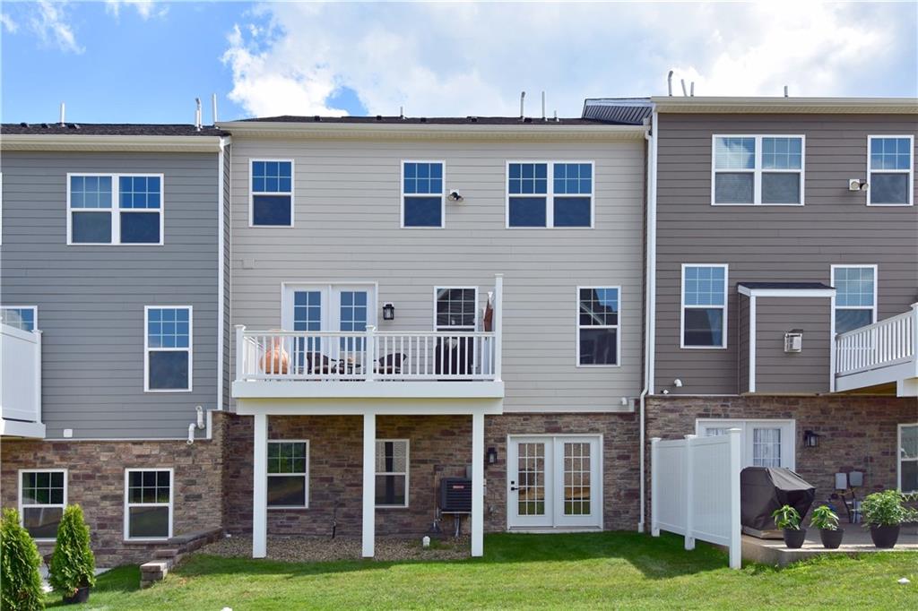 4103 Spruce Road Gibsonia, PA 15044 - Photo 24 of 25 a front view of building with yard and green space