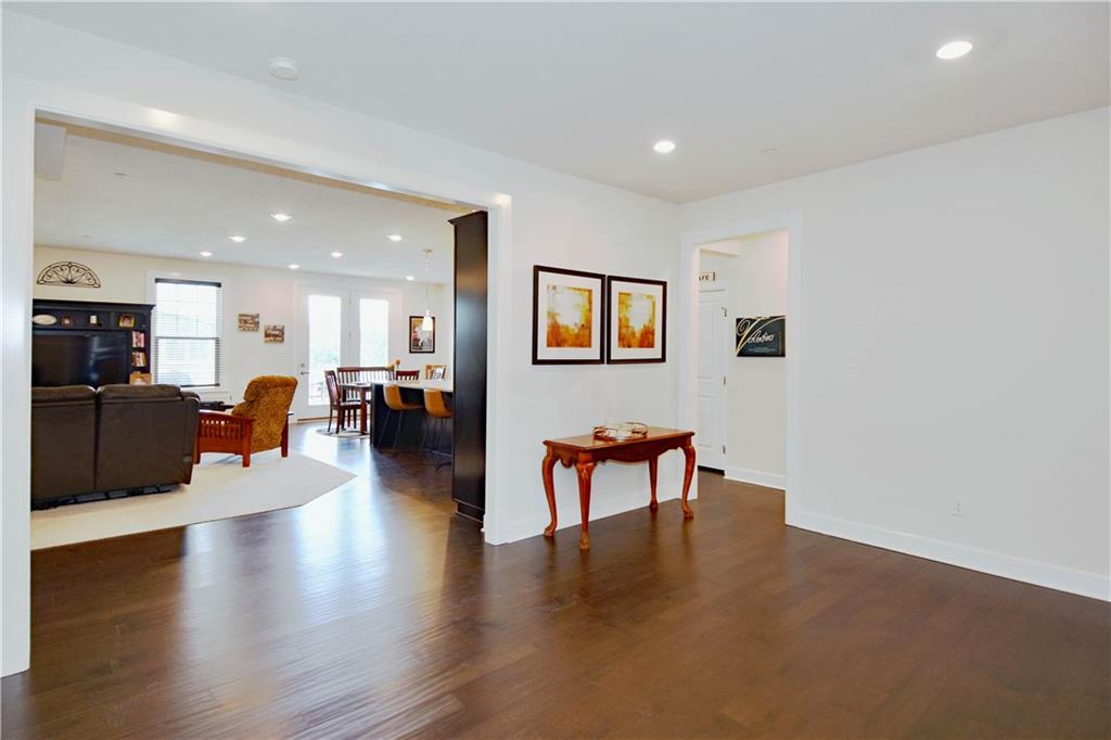 4103 Spruce Road Gibsonia, PA 15044 - Photo 3 of 25 a living room with furniture and a wooden floor