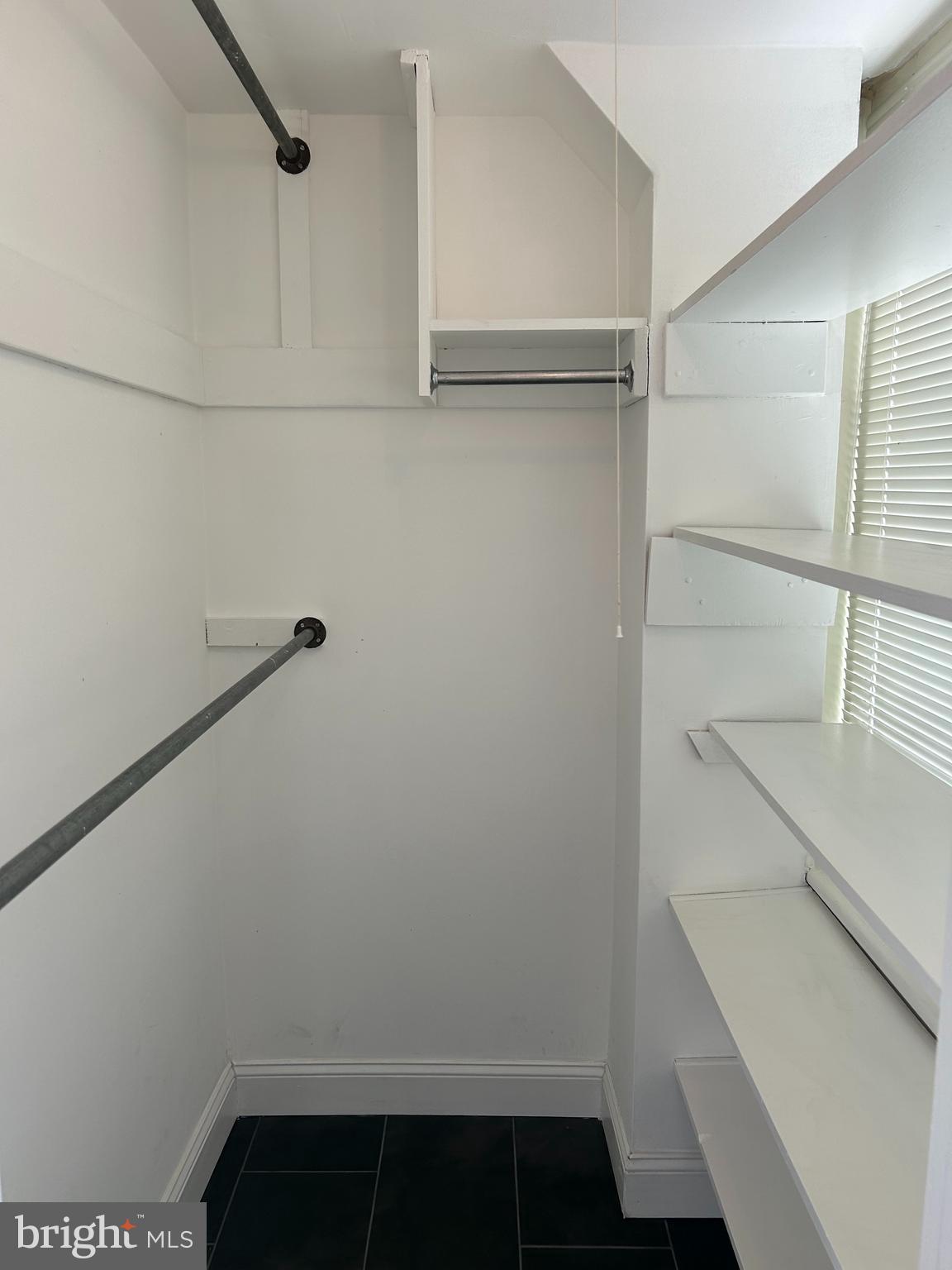 1810-18 Rittenhouse Square, Unit 1609 Philadelphia, PA 19103 - Photo 13 of 14 a view of small space with racks on the wall