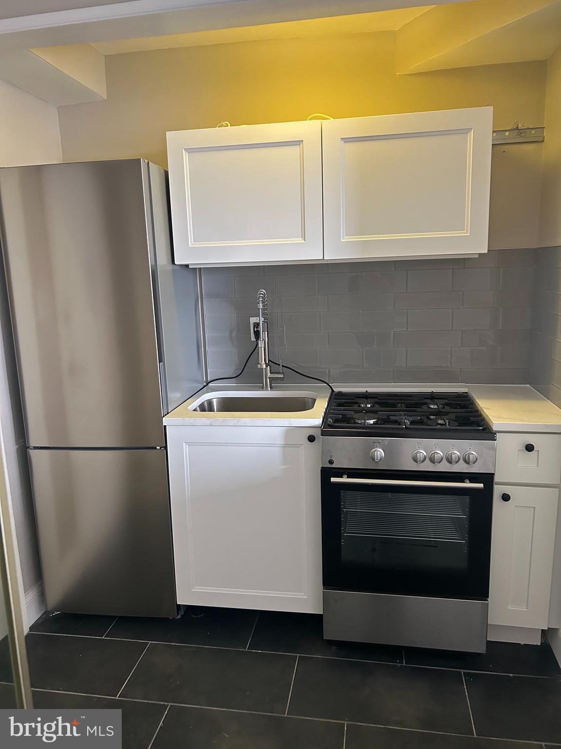 1810-18 Rittenhouse Square, Unit 1609 Philadelphia, PA 19103 - Photo 2 of 14 a utility room with washer and dryer