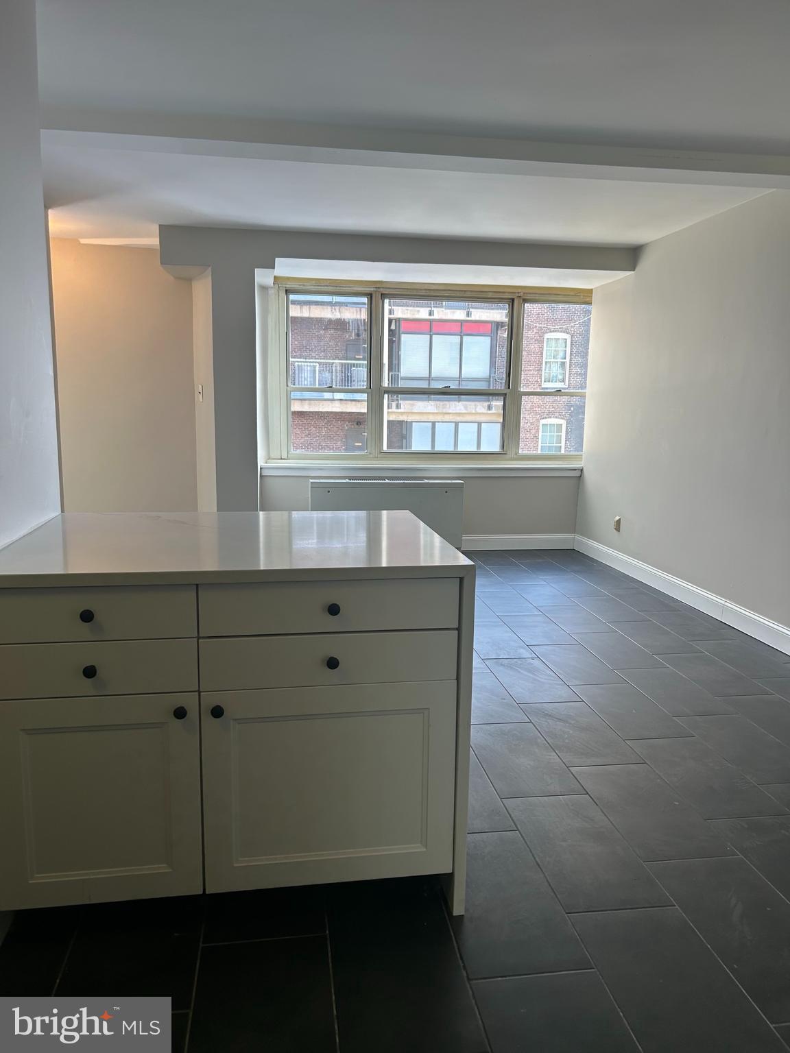 1810-18 Rittenhouse Square, Unit 1609 Philadelphia, PA 19103 - Photo 4 of 14 a view of an empty room with a window