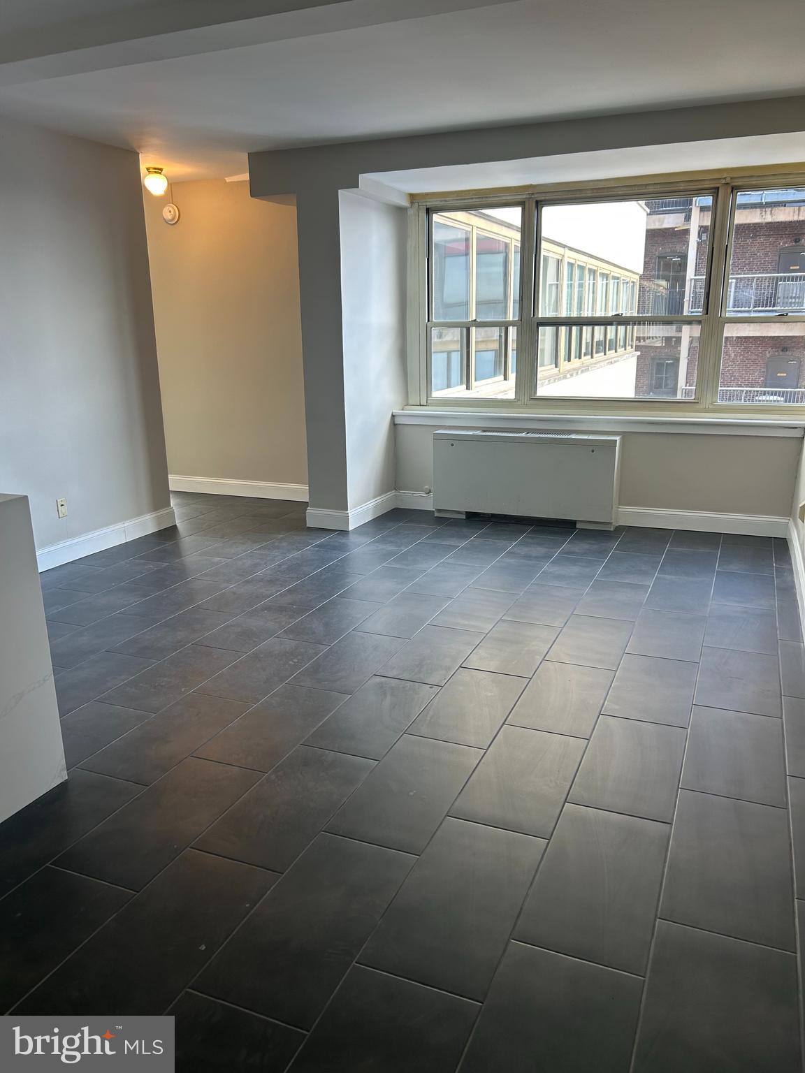 1810-18 Rittenhouse Square, Unit 1609 Philadelphia, PA 19103 - Photo 5 of 14 a view of cabinet and window in a room