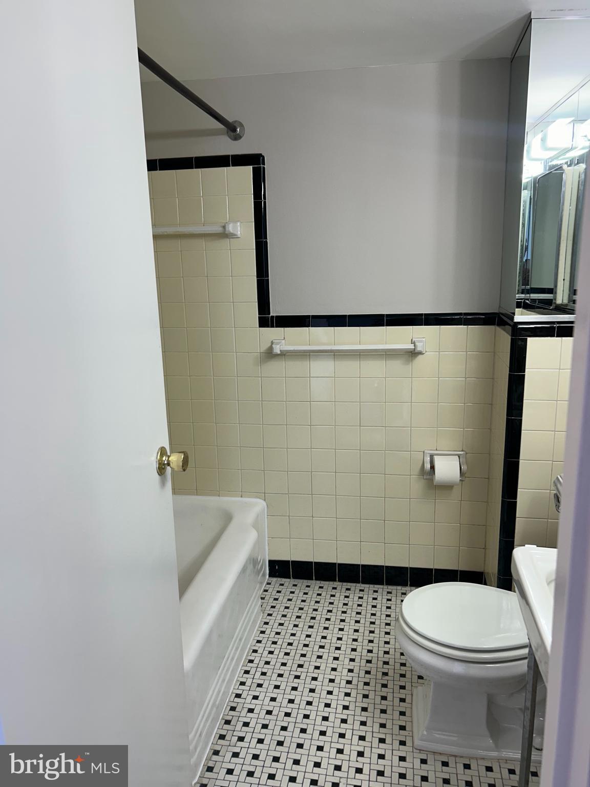 1810-18 Rittenhouse Square, Unit 1609 Philadelphia, PA 19103 - Photo 8 of 14 a bathroom with a toilet and a shower