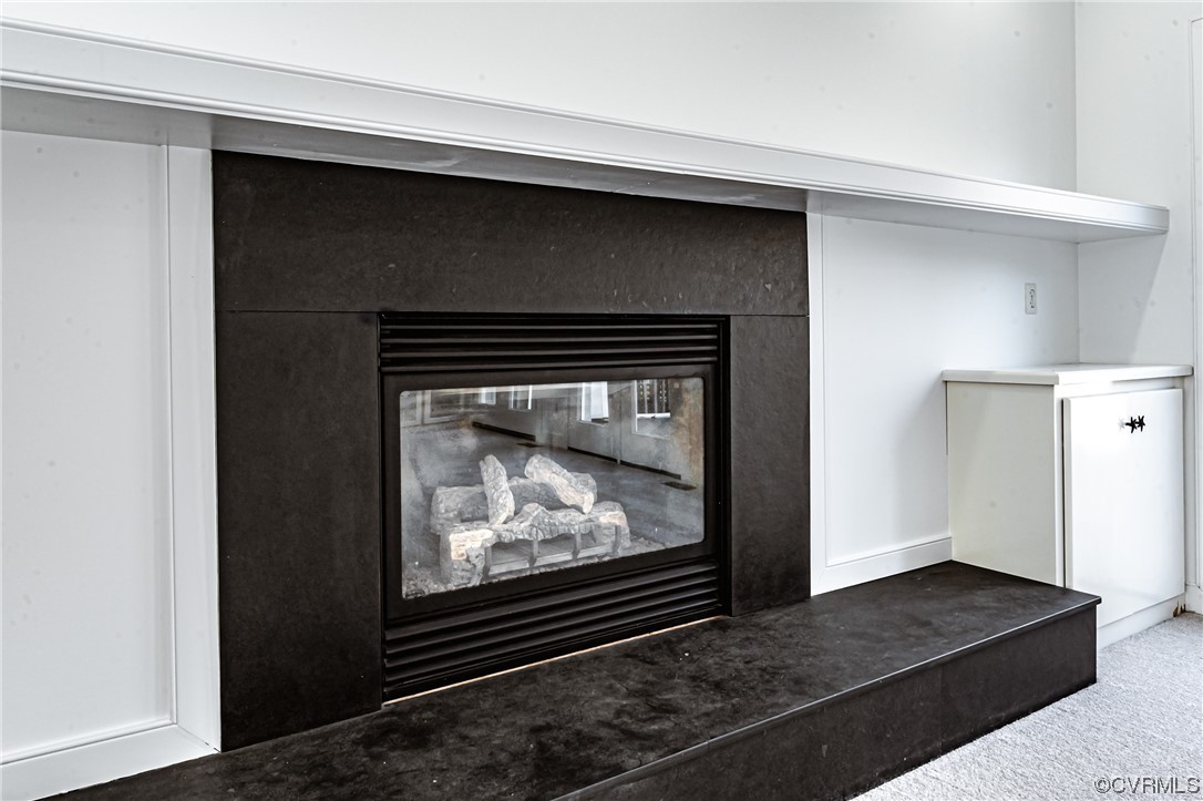 13510 Stonegate Road Midlothian, VA 23113 - Photo 14 of 50 a view of fireplace with wooden floor